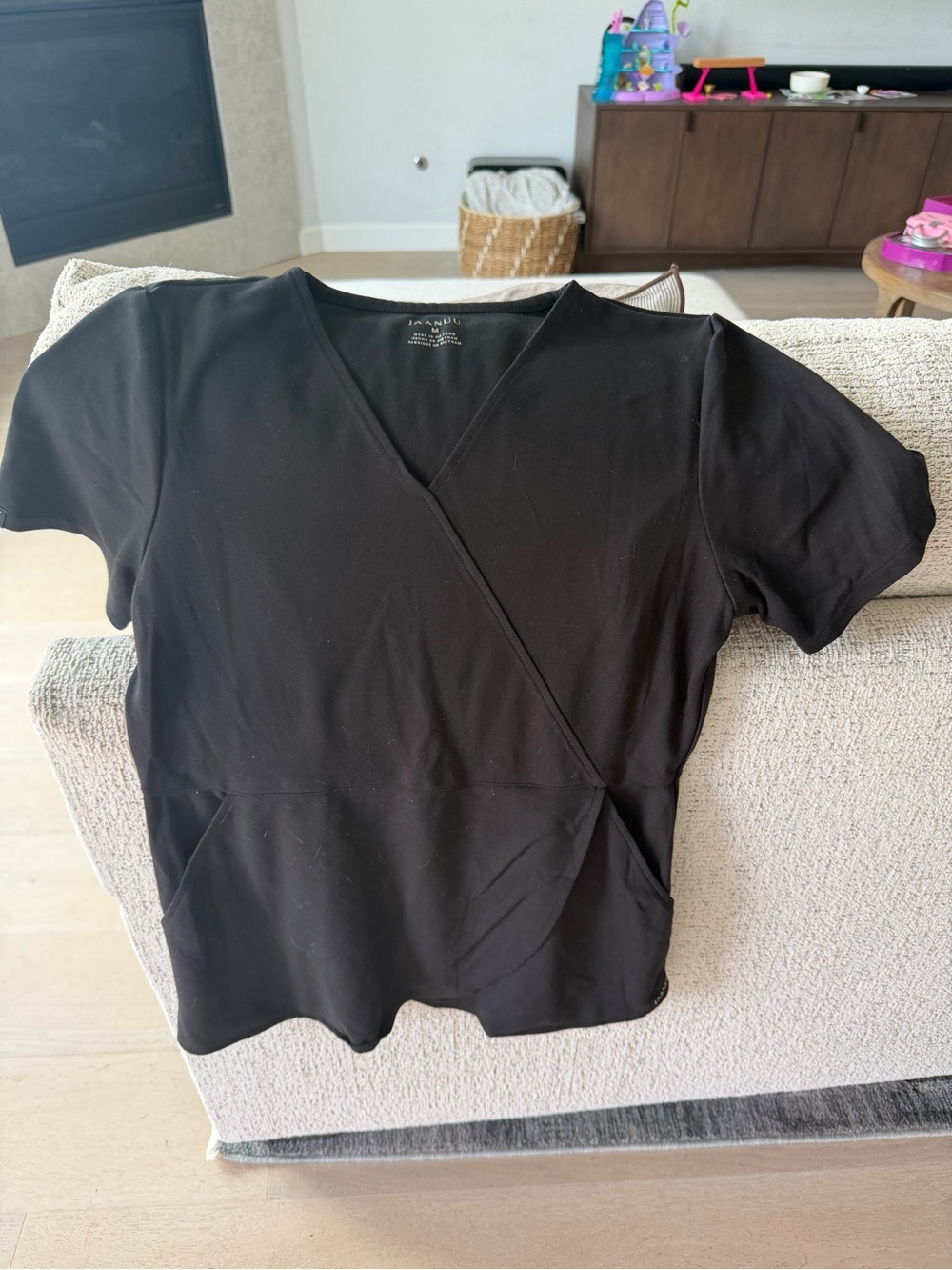 Jaanuu Black Peplum Scrub Top